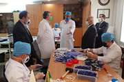 بازدید رئیس دانشگاه از کارگاه تولید ماسک و شیلد در مرکز قلب تهران 