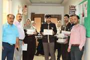 پخش شیرینی و شکلات به مناسبت عید غدیر خم در مرکز آموزشی درمانی ضیائیان