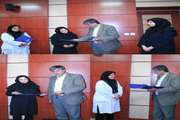 تقدیر از فرشته مقیم خانی و یکتا آصفی توسط رییس دانشکده دندانپزشکی