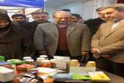 بازدید رییس دانشگاه در افتتاحیه نمایشگاه هشتادمین سال تصویب قانون تأسیس دانشگاه علوم پزشکی تهران از غرفه معاونت غذاو دارو