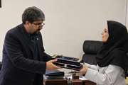 تقدیم حکم بازنشستگی دکتر مینو پاک گوهر درجلسه هیئت رئیسه دانشکده پرستاری و مامایی