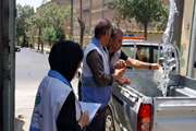 گشت مشترک کارشناس بهداشت محیط مرکز بهداشت جنوب تهران با نماینده اداره آبفا در راستای آمادگی برای مراسم تشییع امام شهید