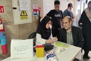 برپایی میز خدمت سلامت در کلینیک شهید سلیمانی شهرستان ری، به مناسبت روز جهانی فشارخون